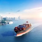 Large cargo container ship arriving in port